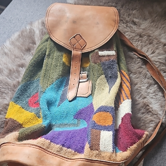 Brown Backpack with Rounded Flap Design and Textured Fabric - Picture 1 of 5